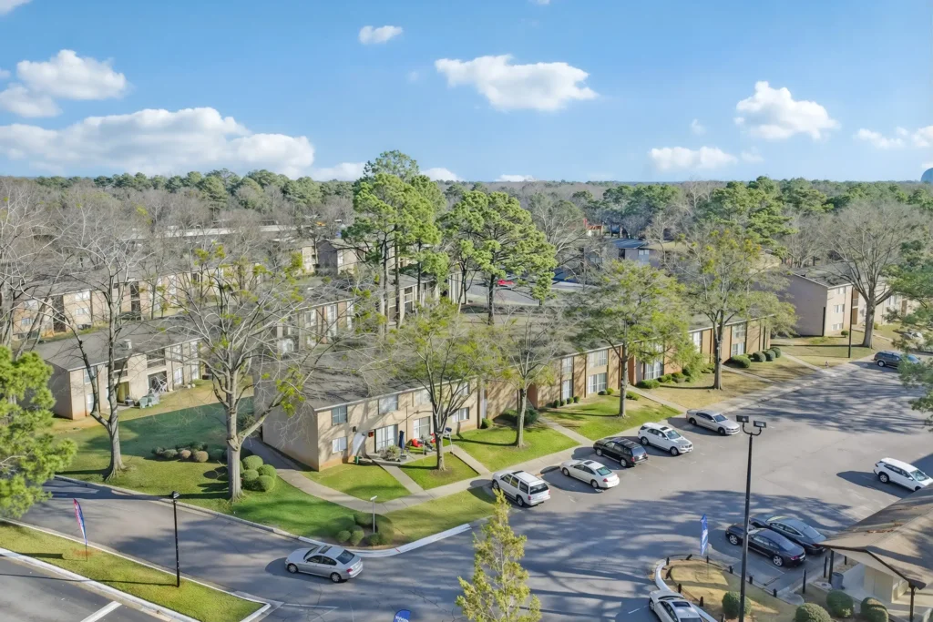 Aerial view of the 44-acre gated community at The Village on Riverwalk in College Park, GA, featuring lush landscaping and mature trees.
