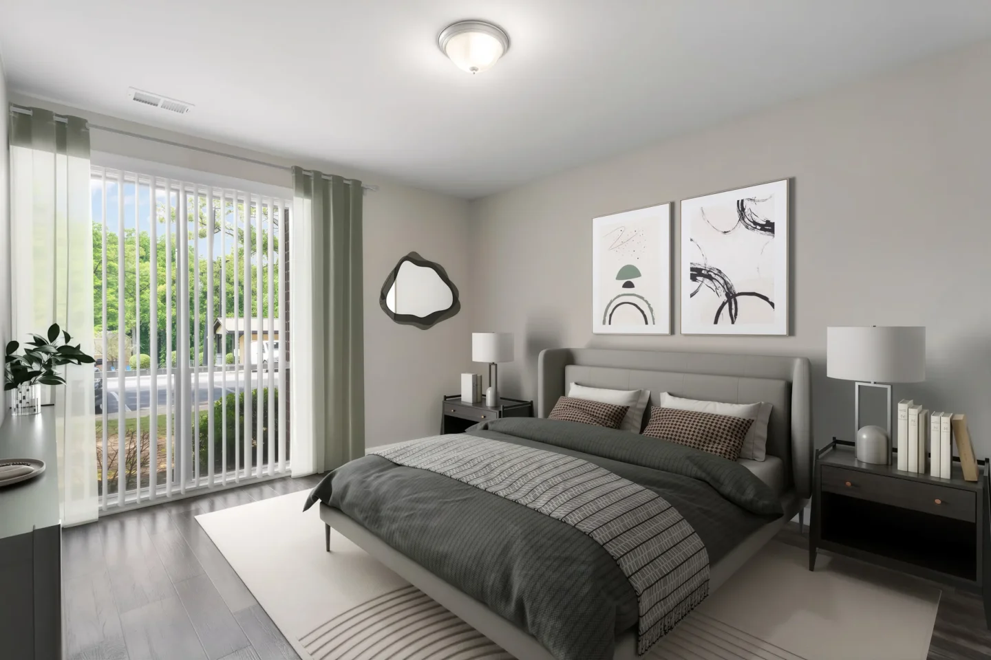 Modern bedroom at The Village on Riverwalk in College Park, GA, featuring a floor-to-ceiling window with soft, natural light.